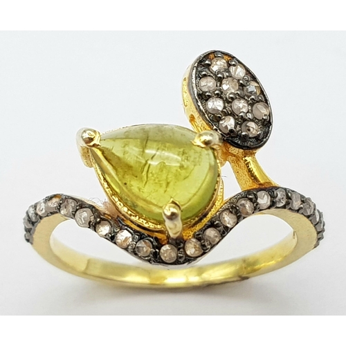 5 - A Nigerian Tourmaline & Diamond Crossover Ring set in 925 Gold Plated Silver. Tourmaline - 0.40ct. D... 