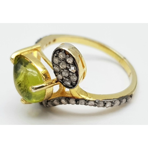 5 - A Nigerian Tourmaline & Diamond Crossover Ring set in 925 Gold Plated Silver. Tourmaline - 0.40ct. D... 