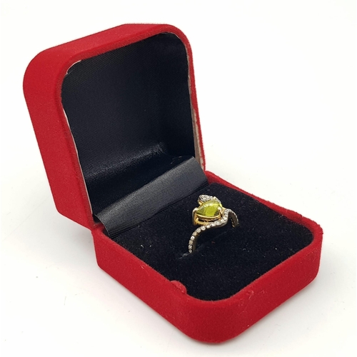 5 - A Nigerian Tourmaline & Diamond Crossover Ring set in 925 Gold Plated Silver. Tourmaline - 0.40ct. D... 