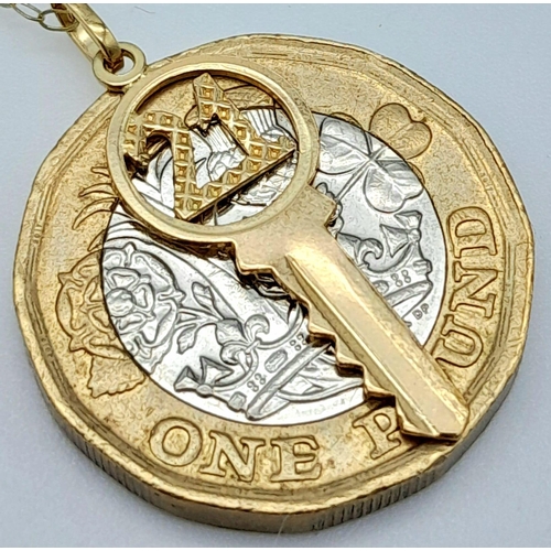 1097 - A 9k Yellow Gold 21 Pendant on a 9K Yellow Gold Disappearing Necklace. 2cm and 46cm. 1g total weight... 