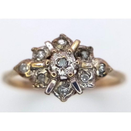 1104 - A Vintage 9K Yellow Gold Diamond Cluster Ring. Size H. 1.05g weight.