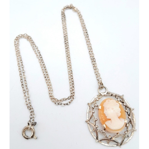 831 - A vintage sterling silver Cameo pendant on silver chain. Total weight 4.7G. Total length 47cm.