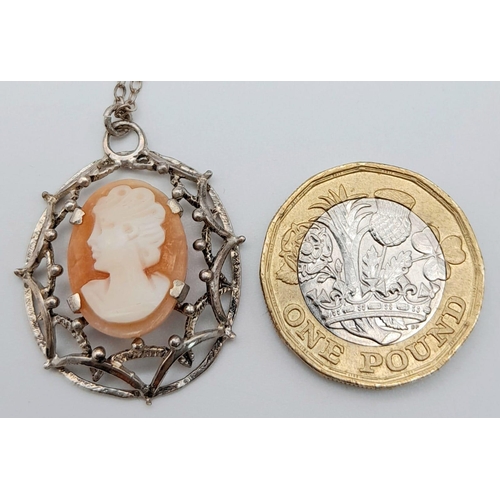 831 - A vintage sterling silver Cameo pendant on silver chain. Total weight 4.7G. Total length 47cm.