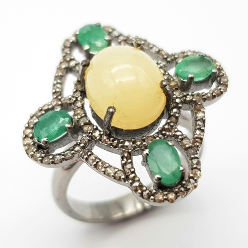 198 - A Beautifully Designed 2.25ct Opal Ring with 0.90ctw of Emeralds and 0.85ctw of Diamond Accents. Siz... 