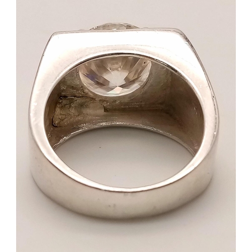 240 - A 6.10ct White Moissanite Gents Ring set in 925 Silver. Size S. 10.5g total weight. Ref: CD-1250