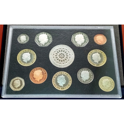 31 - A Royal Mint 2007 Executive Proof Coin Set. 12 coins in total. Comes in a wood presentation case.