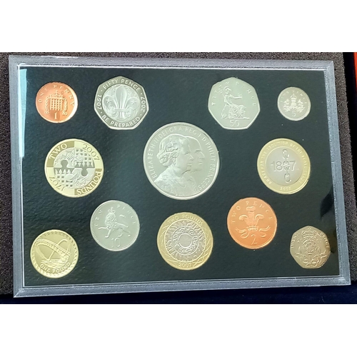 31 - A Royal Mint 2007 Executive Proof Coin Set. 12 coins in total. Comes in a wood presentation case.