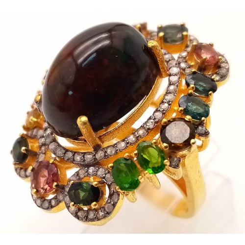 60 - A 15ct Black Opal Ring with Multi-Coloured Tourmaline and Diamond Accents. Set in gilded 925 Silver.... 