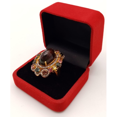 60 - A 15ct Black Opal Ring with Multi-Coloured Tourmaline and Diamond Accents. Set in gilded 925 Silver.... 