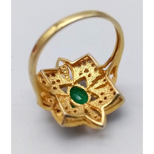 12 - A Zambian Emerald and Diamond Ring set in Gold Plated 925 Silver. Weight - 3.80g.  Emerald- 0.40ct. ... 