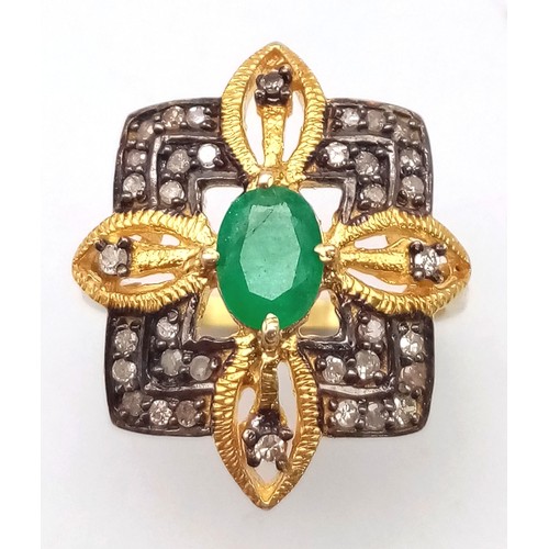 12 - A Zambian Emerald and Diamond Ring set in Gold Plated 925 Silver. Weight - 3.80g.  Emerald- 0.40ct. ... 