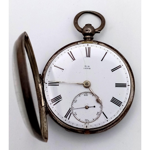 1280 - An Antique Sterling Silver Cased H.H. 1868 Pocket Watch. Hallmarks for London 1862. White dial with ... 