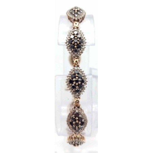 1274 - AN ATTRACTIVE 9K YELLOW GOLD BLACK AND WHITE DIAMOND BRACELET WITH SAFETY CATCH, 3.50CT APPROX DIAMO... 