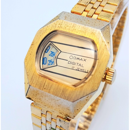 255 - A Classic Vintage Omax Ladies Mechanical Jump Watch. Gilded bracelet and case - 26mm. Gold tone dial... 