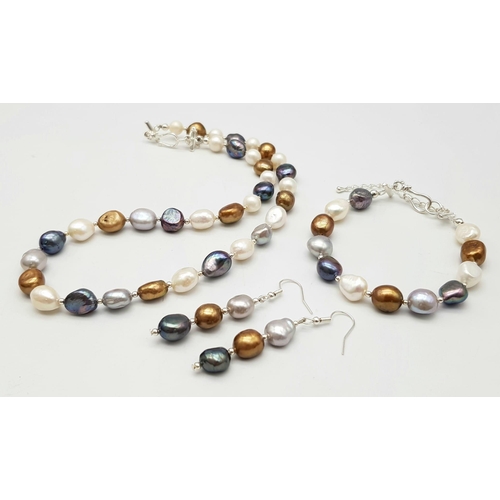 305 - A natural, multi-coloured pearl necklace, bracelet and earrings set, in a presentation box. Necklace... 