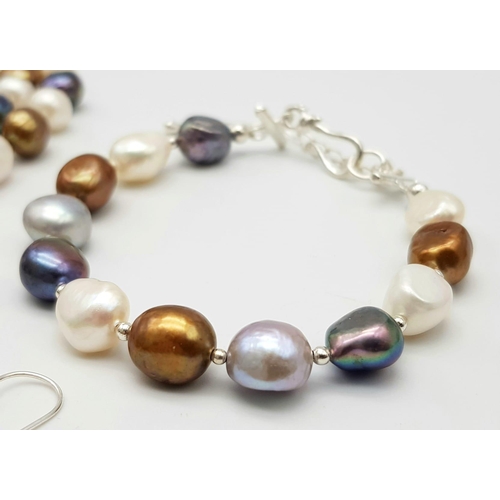 305 - A natural, multi-coloured pearl necklace, bracelet and earrings set, in a presentation box. Necklace... 