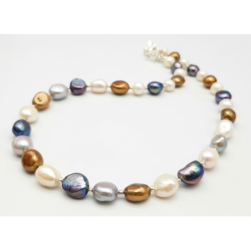 305 - A natural, multi-coloured pearl necklace, bracelet and earrings set, in a presentation box. Necklace... 