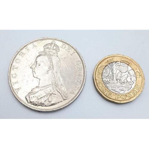 345 - An 1887 Queen Victoria Silver Double Florin Coin. VF+ Grade but please see photos for conditions.