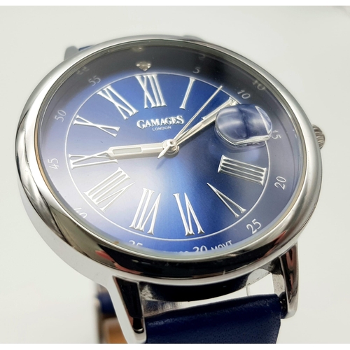 452 - A Gamages of London Quartz Ladies Watch. Blue leather strap. Stainless steel case - 37mm. Ice blue d... 