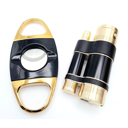 214 - A highly collectable COHIBA lighter and cigar cutter set. This is a commemorative, limited edition c... 