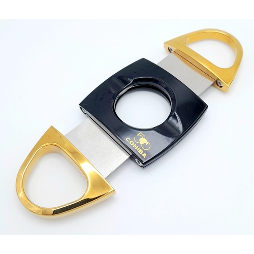 214 - A highly collectable COHIBA lighter and cigar cutter set. This is a commemorative, limited edition c... 