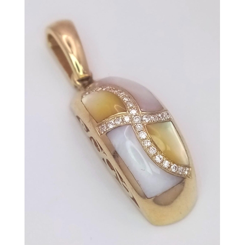 220 - A 14 K yellow gold pendant with yellow and white Mother of pearl and diamonds arranged in a curvy cr... 