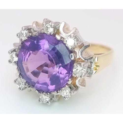 344 - A Gorgeous 14K Yellow Gold Amethyst and Diamond Ring. Central round cut 5ct amethyst with a brillian... 