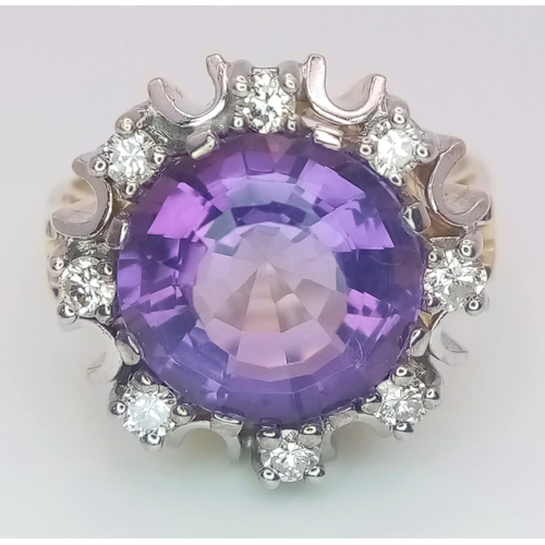 344 - A Gorgeous 14K Yellow Gold Amethyst and Diamond Ring. Central round cut 5ct amethyst with a brillian... 