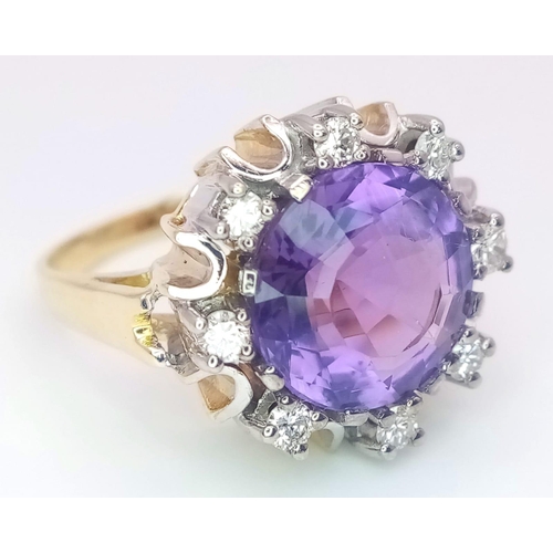 344 - A Gorgeous 14K Yellow Gold Amethyst and Diamond Ring. Central round cut 5ct amethyst with a brillian... 