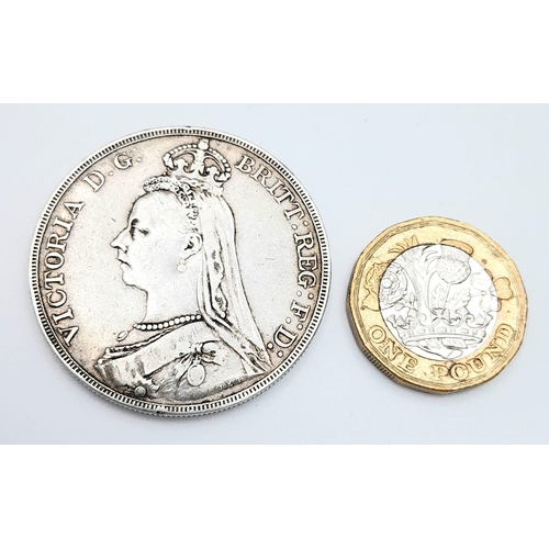 351 - An 1889 Queen Victoria Silver Crown Coin. VF+ grade but please see photos for conditions.