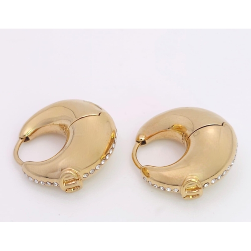 375 - A gold plated  DIOR pair of earrings with  cubic zirconia. Dimensions: 21 x 22 x 10 mm.