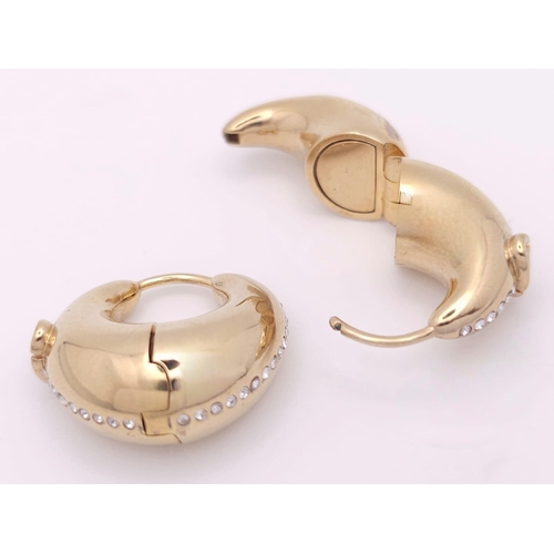 375 - A gold plated  DIOR pair of earrings with  cubic zirconia. Dimensions: 21 x 22 x 10 mm.