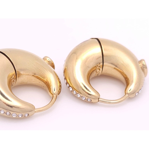 375 - A gold plated  DIOR pair of earrings with  cubic zirconia. Dimensions: 21 x 22 x 10 mm.