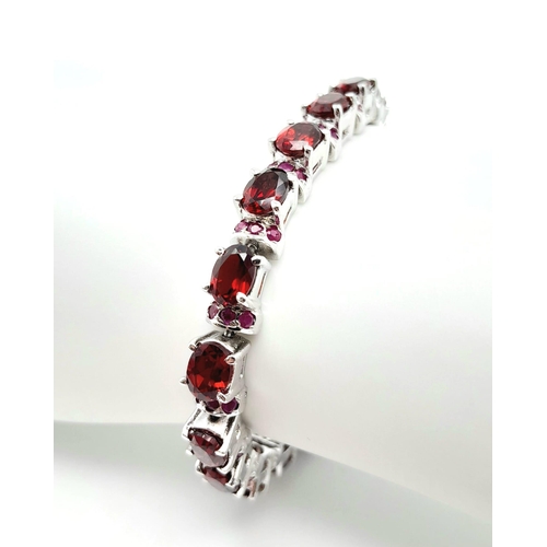 40 - A Hessonite Garnet & Madagascar, Ruby Spacer Gemstone 925 Silver Bracelet. Weight - 28.9g. 18cm leng... 