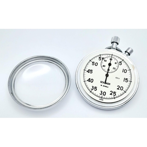 459 - A Vintage Sekonda Stopwatch. Stainless steel case -54mm. White dial with second sub dial. Top winder... 