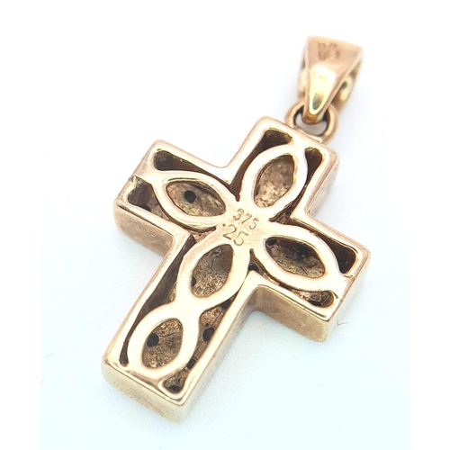 465 - A 9 K yellow gold cross studded with diamonds (0.25 carats), dimensions (with bail): 24 x 14 x 4 mm,... 