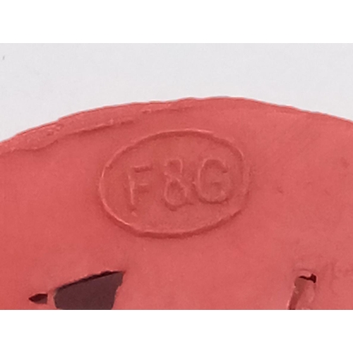 468 - WW2 Red Plastic Salvage Steward’s Badge. Marked “Pat Applied For” on rear.