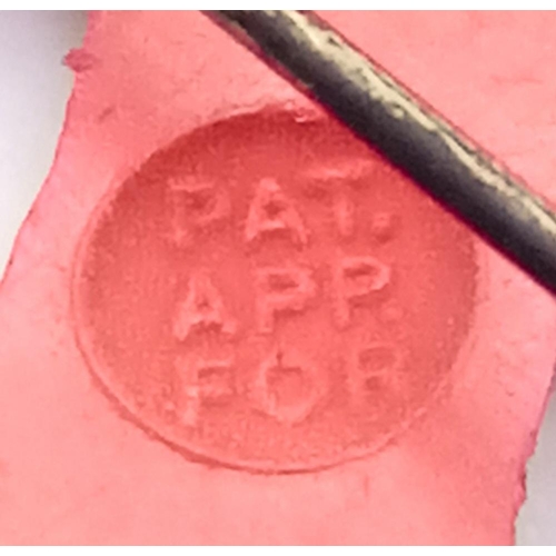 468 - WW2 Red Plastic Salvage Steward’s Badge. Marked “Pat Applied For” on rear.