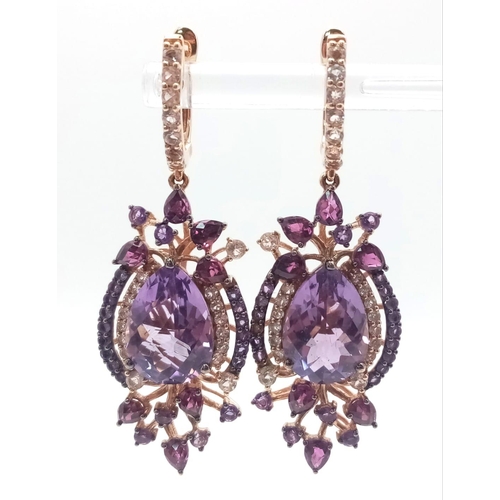 67 - A stunning LE VIAN design, 14 K rose gold ring and earrings set with large pear shaped amethysts and... 