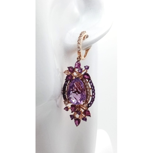 67 - A stunning LE VIAN design, 14 K rose gold ring and earrings set with large pear shaped amethysts and... 