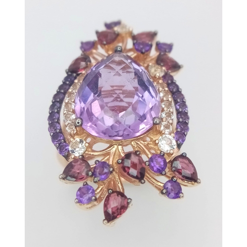 67 - A stunning LE VIAN design, 14 K rose gold ring and earrings set with large pear shaped amethysts and... 