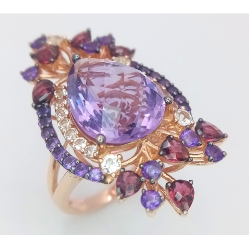 67 - A stunning LE VIAN design, 14 K rose gold ring and earrings set with large pear shaped amethysts and... 