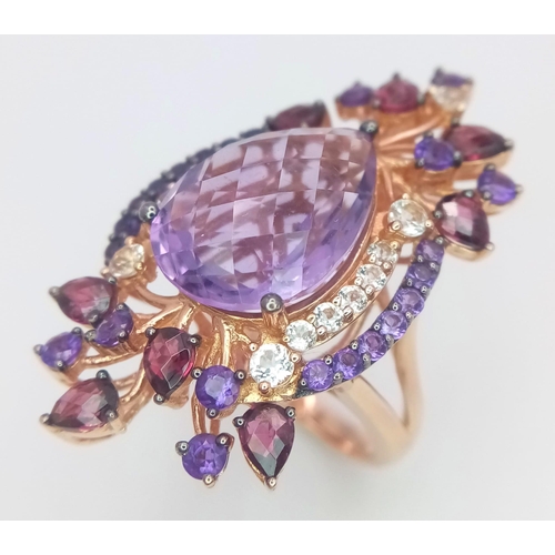 67 - A stunning LE VIAN design, 14 K rose gold ring and earrings set with large pear shaped amethysts and... 