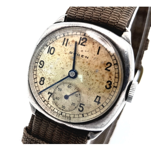 325 - A Vintage Buren (1940s) Mechanical Gents Watch. Textile strap. Stainless steel case - 30mm. Patinaed... 