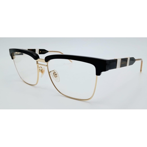 332 - A GUCCI pair of glasses, gold plated in parts with mother of pearl highlights. Very stylish!