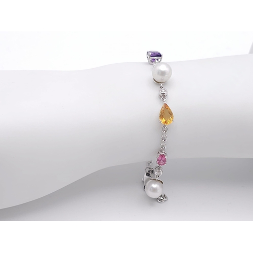 46 - An 18 K white gold chain bracelet with a variety of gemstones (peridot, amethyst, citrine, etc) and ... 