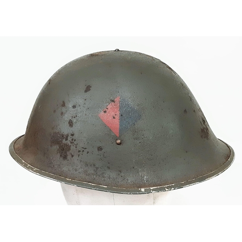 139 - WW2 British 44 Pattern “Turtle” D-Day Helmet and liner, with insignia of the Royal Artillery.