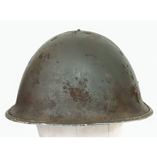 139 - WW2 British 44 Pattern “Turtle” D-Day Helmet and liner, with insignia of the Royal Artillery.