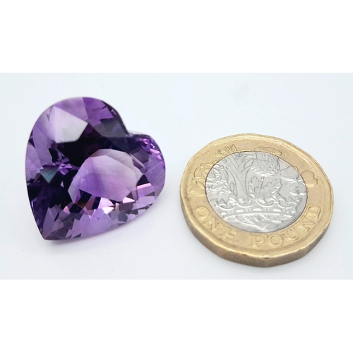 410 - A large (30.96 carats), heart shaped mix cut, amethyst, dimensions: 20.64 x 21.31 x 14.83 mm, good u... 