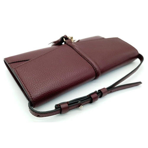 438 - A Lance Burgundy Leather Hand/Shoulder Flap Bag. Textured leather exterior. Soft red textile interio... 